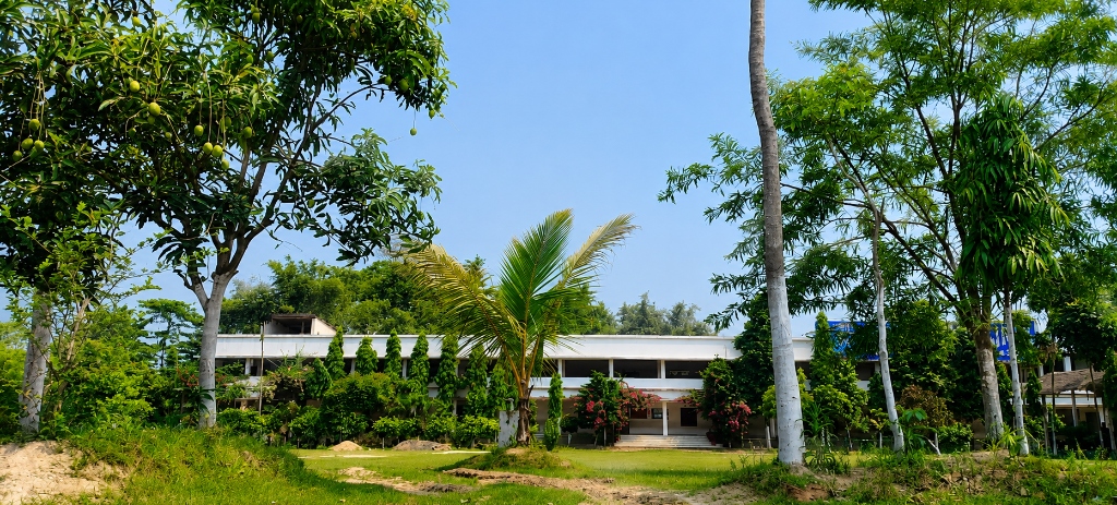 Lush green lawn and gardens at Christ Mission School campus