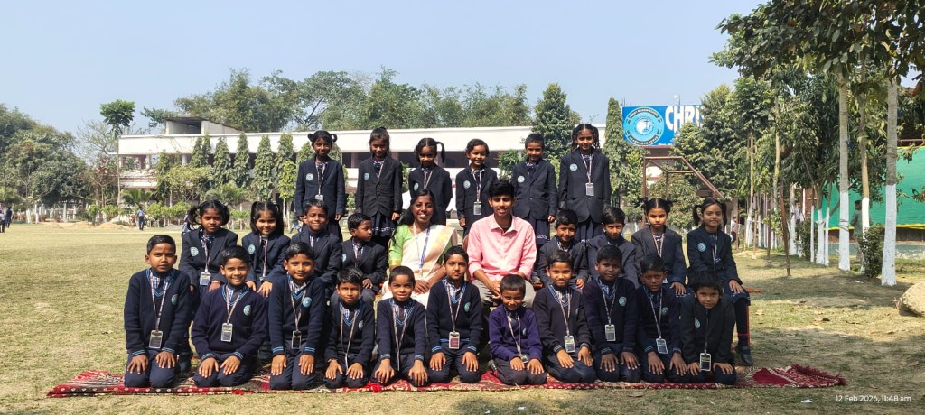 Primary students group photograph with teachers at Christ Mission School
