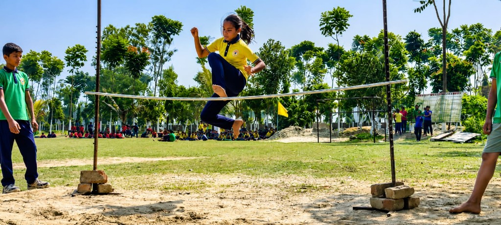 Student performing high jump at the Annual Sports Meet opening at Christ Mission School